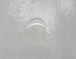 Appearance after dripping vegetable oil onto a coated surface and leaving it for 24 hours