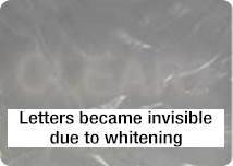 Letters became invisible due to whitening